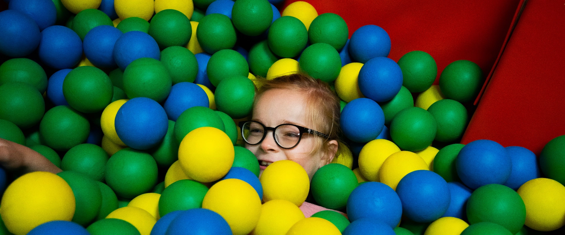 Student in the ball pool.